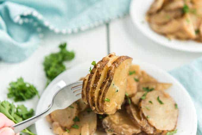 fork with scalloped cheesy potatoes 