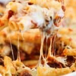 baked ziti in white casserole dish