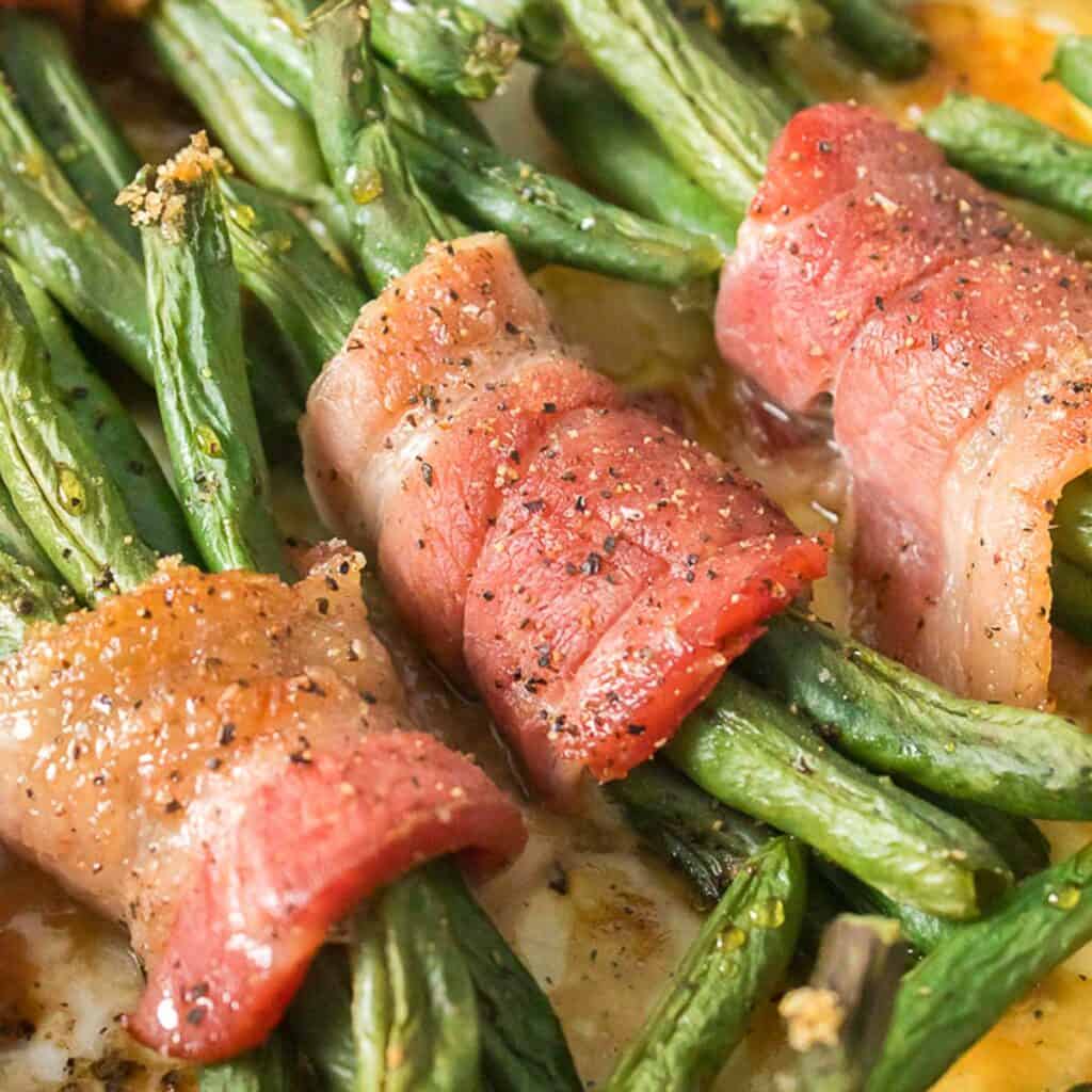 close up of bacon wrapped green bean bundles