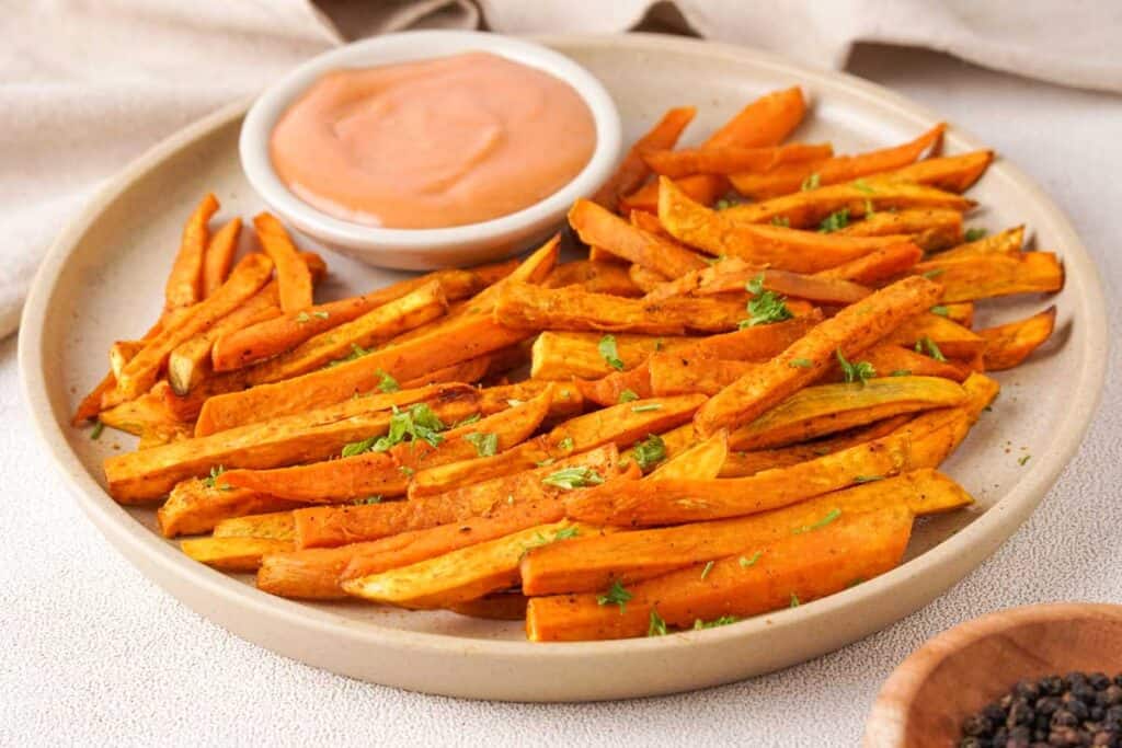 sweet potato fried and dipping sauce on plate