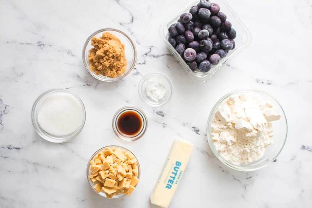 blueberry cookie ingredients on marble countertop