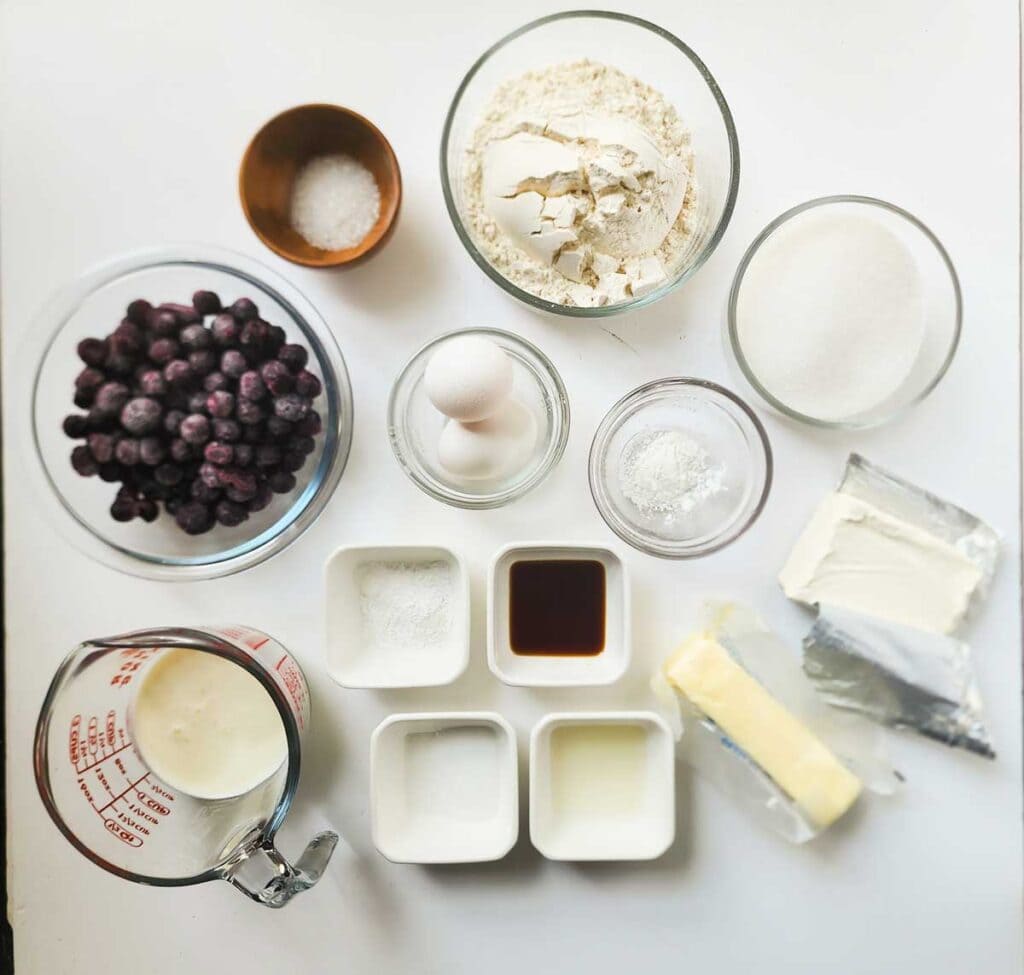 blueberry cream cheese muffin ingredients on white countertop