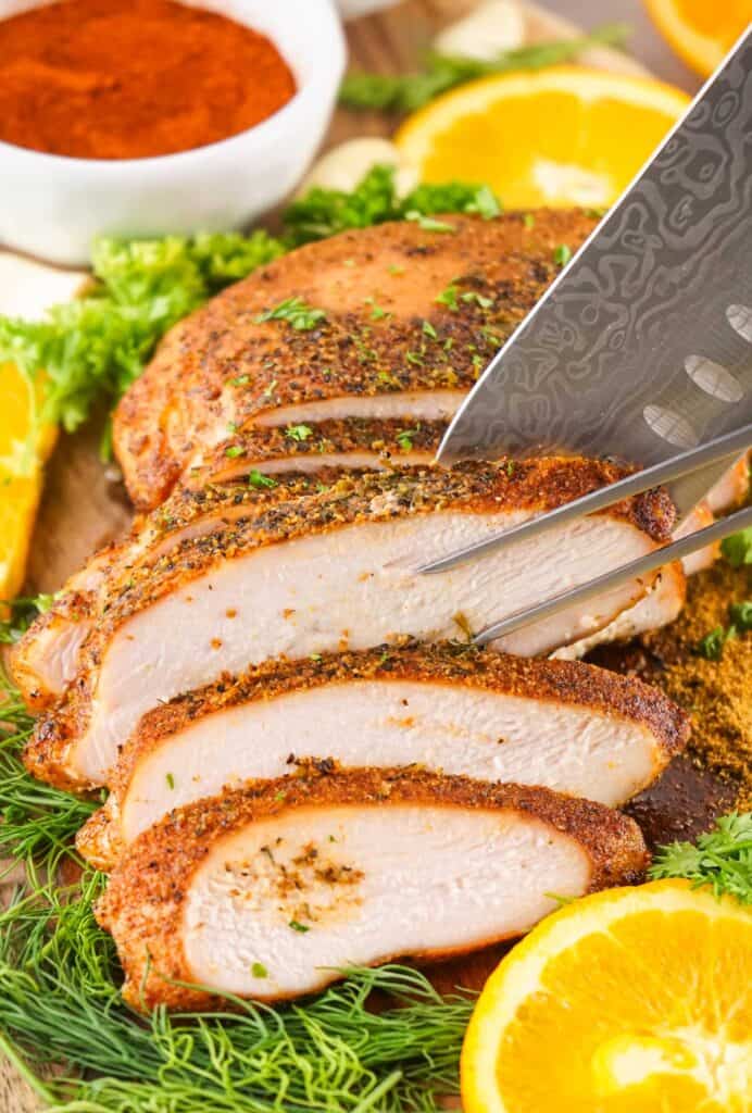 knive carving smoked cajun turkey breast