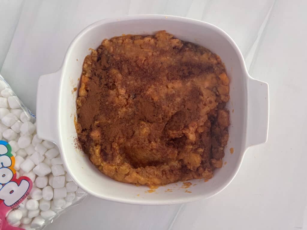 sweet potato casserole with cinnamon on top