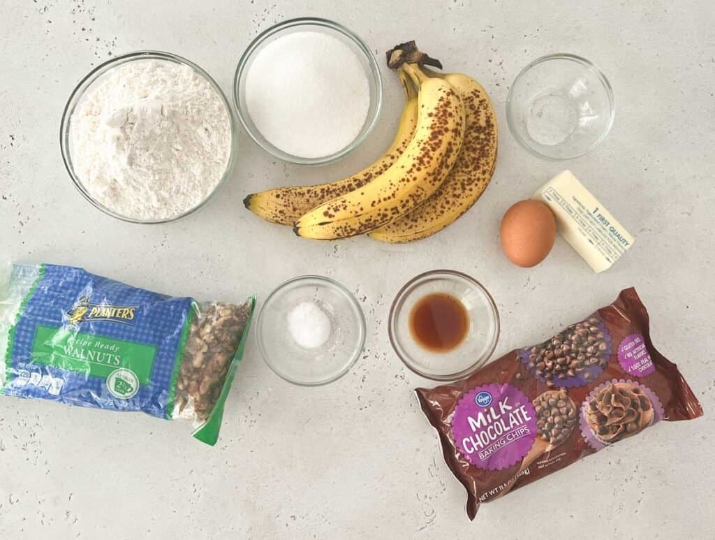 chocolate chip walnut banana bread ingredients on countertop