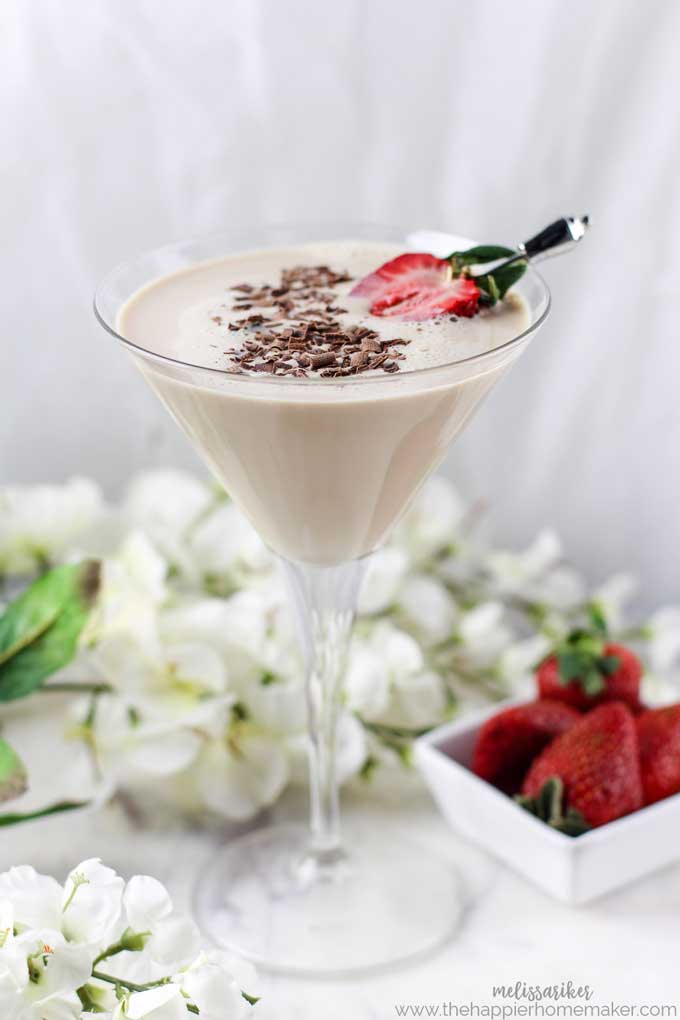 chocolate martini garnished with strawberries and shaved chocolate