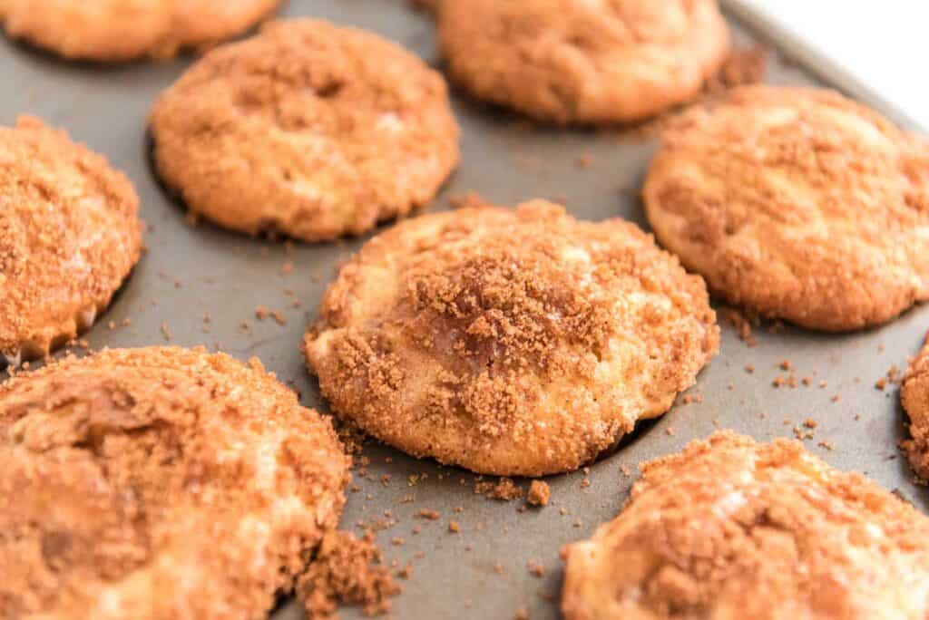 cinnamon apple muffins in baking tin