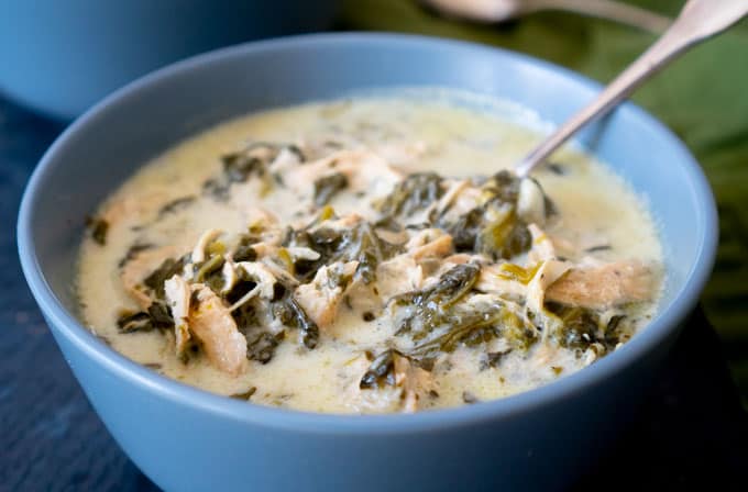 instant pot keto chicken spinach soup in blue bowl with spoon