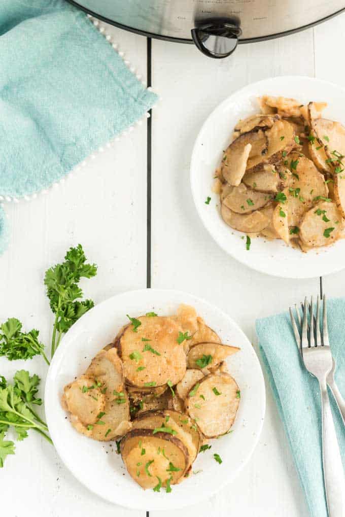 Slow Cooker Au Gratin Potatoes on 2 white plates