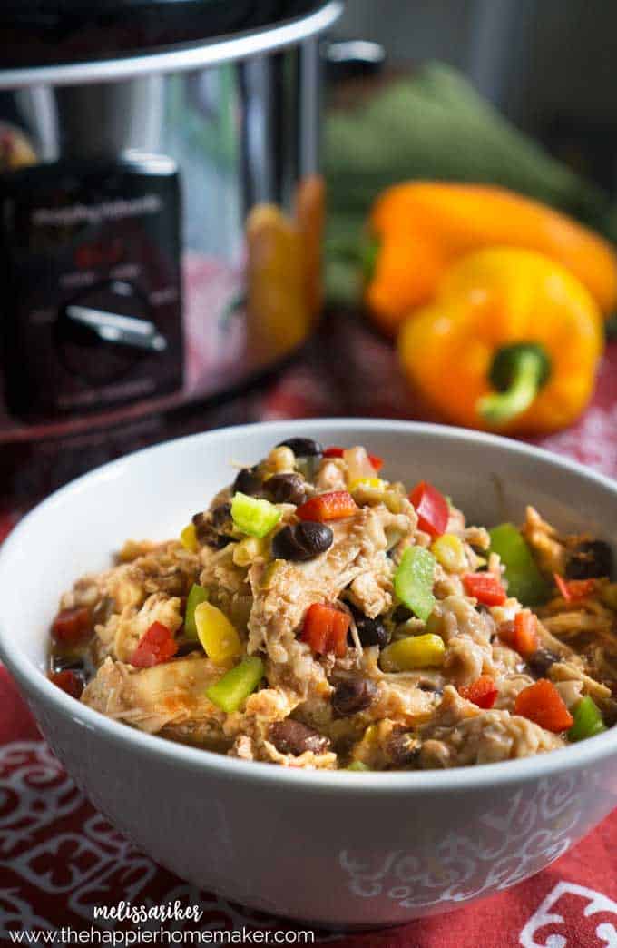 Mexican flavored chicken with orange peppers in bowl
