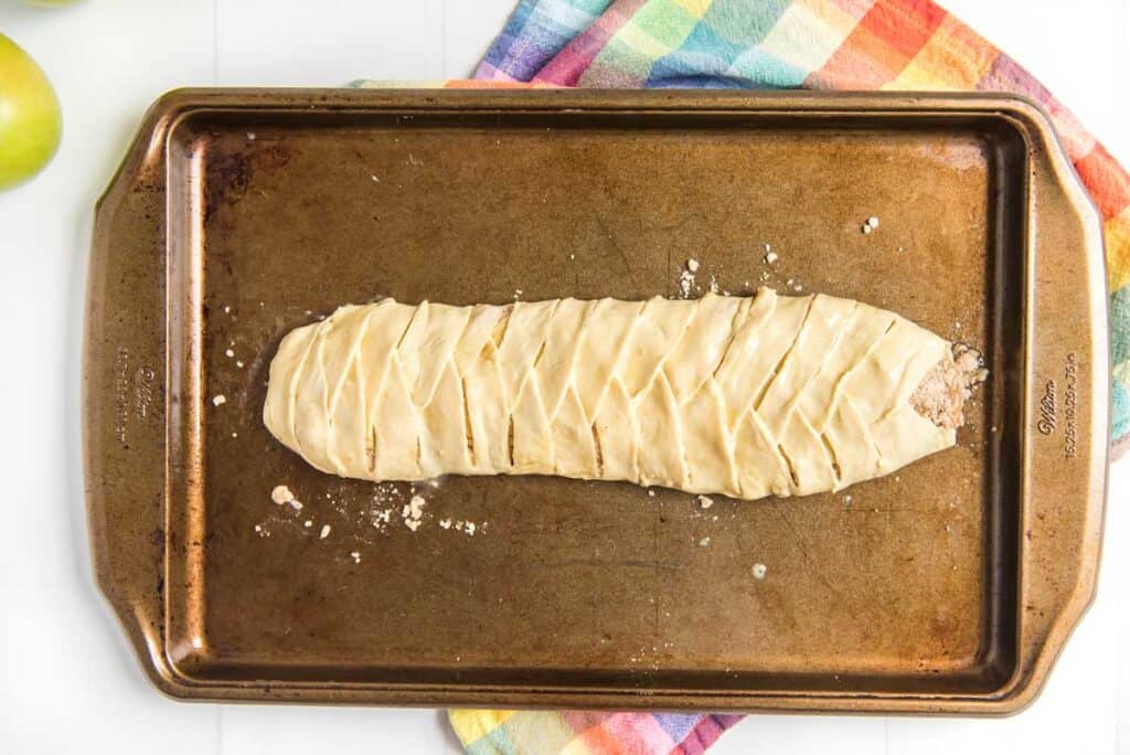 braided danish on pan before baking