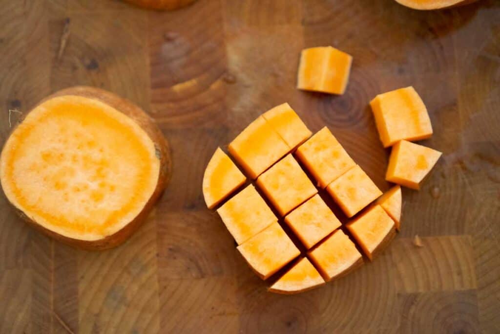 diced sweet potato on cutting board