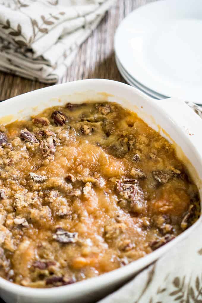 sweet potato casserole in white casserole dish
