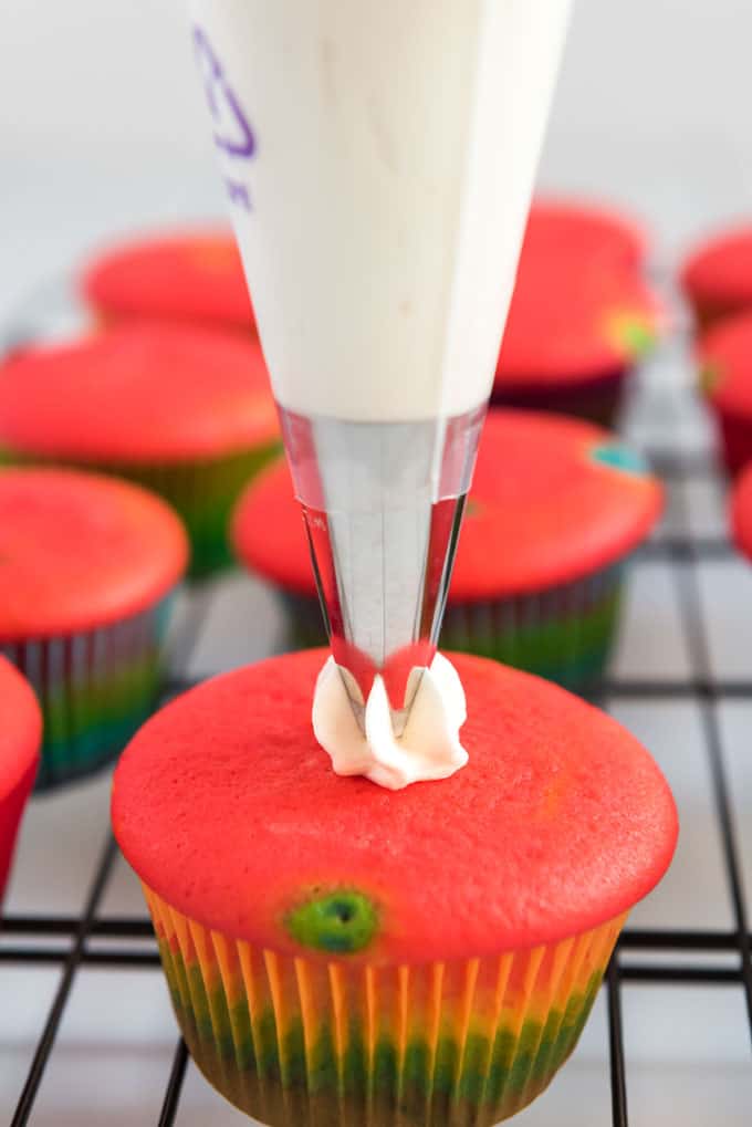 frosting rainbow cupcakes