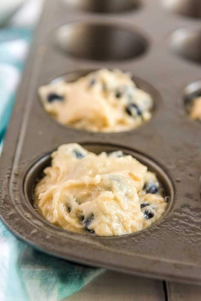 blueberry muffin batter in pan