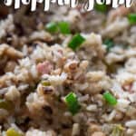 hoppin john with black eyed peas and rice in pan with text overlay