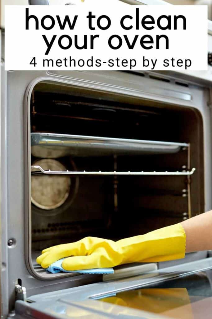 hand in glove wiping down oven rack