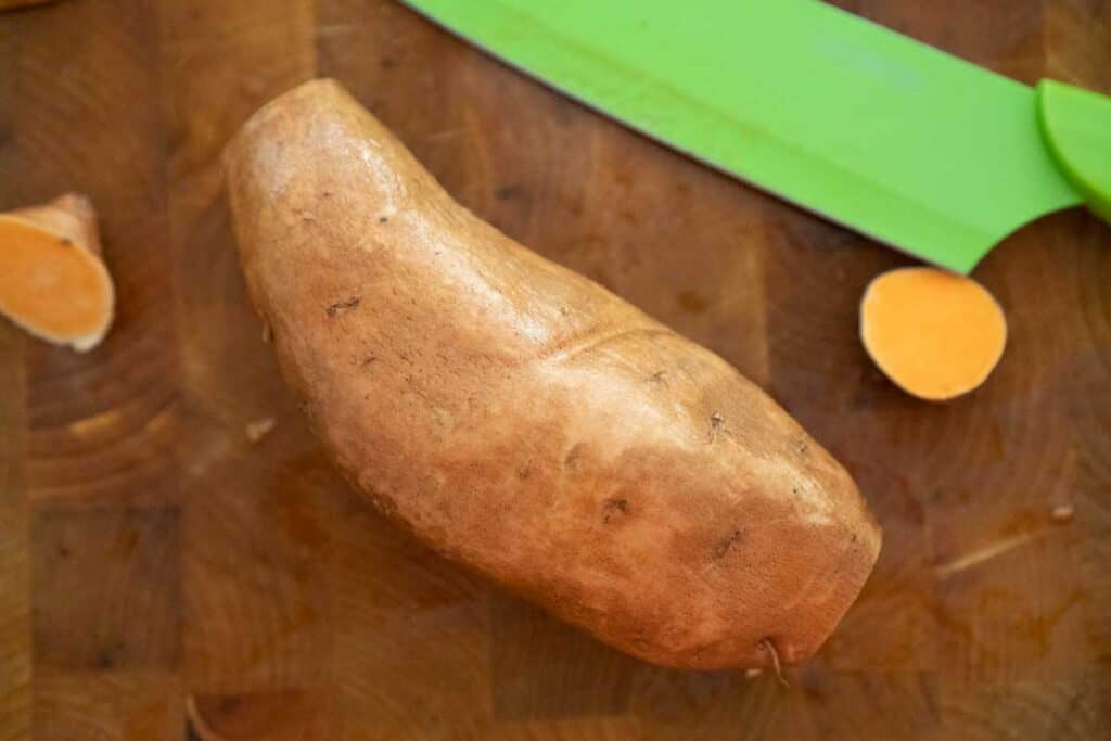 sweet potato on cuttingboard