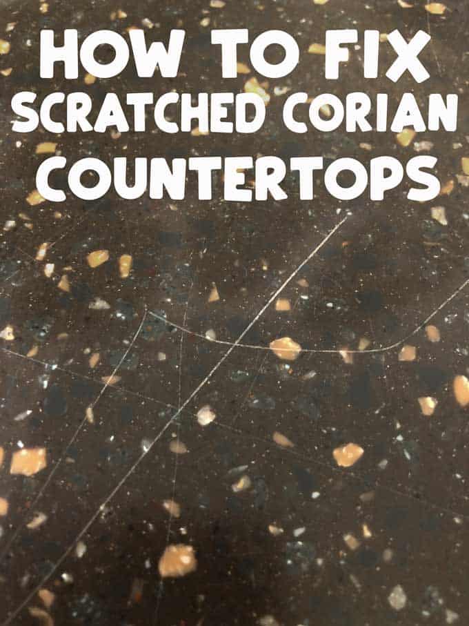 scratched counter with text overlay reading scratched corian counterotps