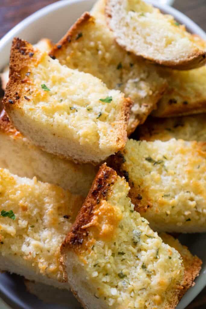 garlic bread in white bowl