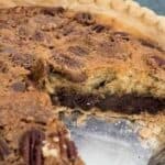 text reading kentucky derby pie over photo of pie with one slice missing