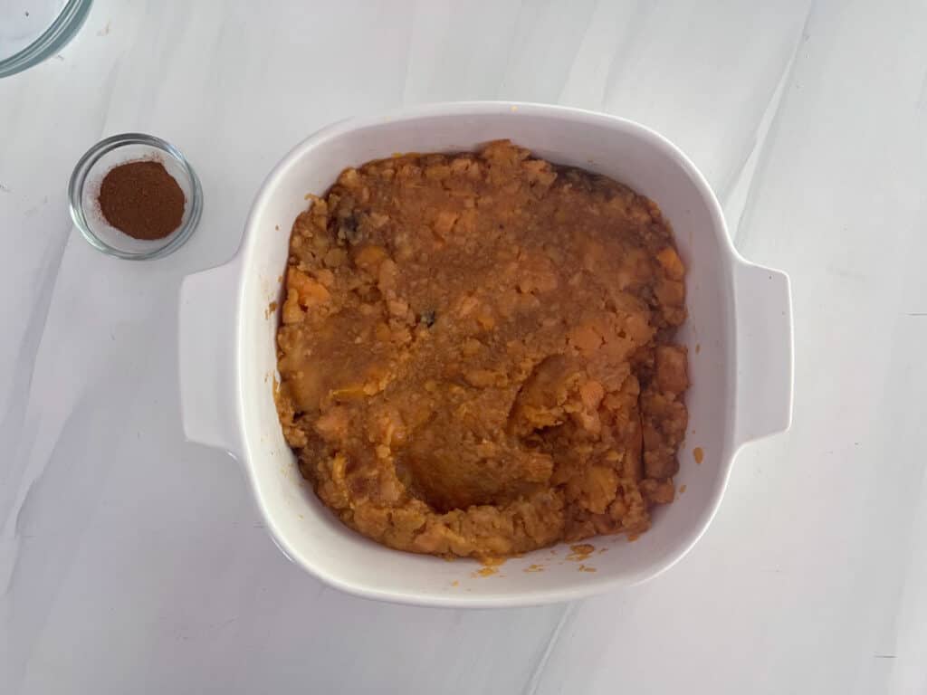 sweet potato mixture in white baking dish