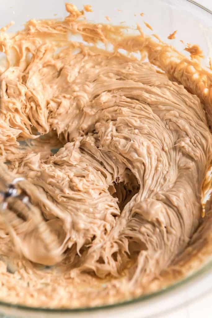 mixing peanut butter buttercream frosting