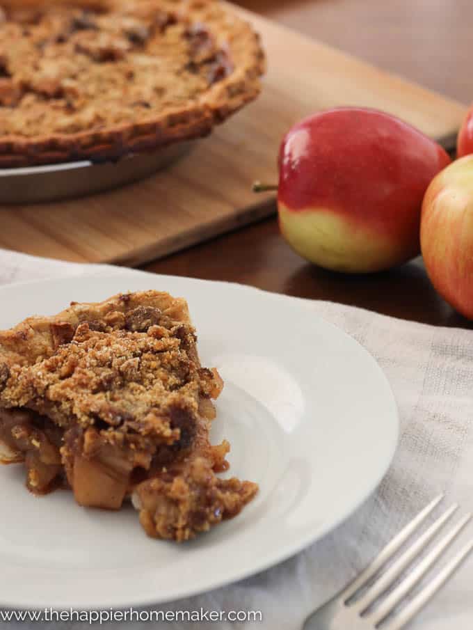 slice of dutch apple crumb pie on a white plate