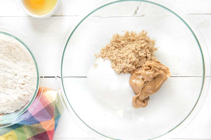 peanut butter cookie bar ingredients in bowls