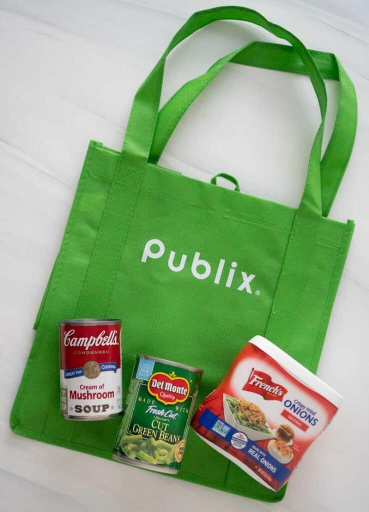 publix reusable shopping bag with campbells cream of mushrooms osoup, canned green beans amd frenchs crispy onions