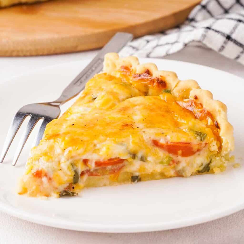 slice of Italian tomato pie on white plate