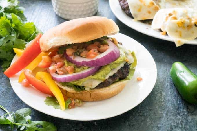 southwest burger with guacamole peppers cilantro cheese pico de gallo
