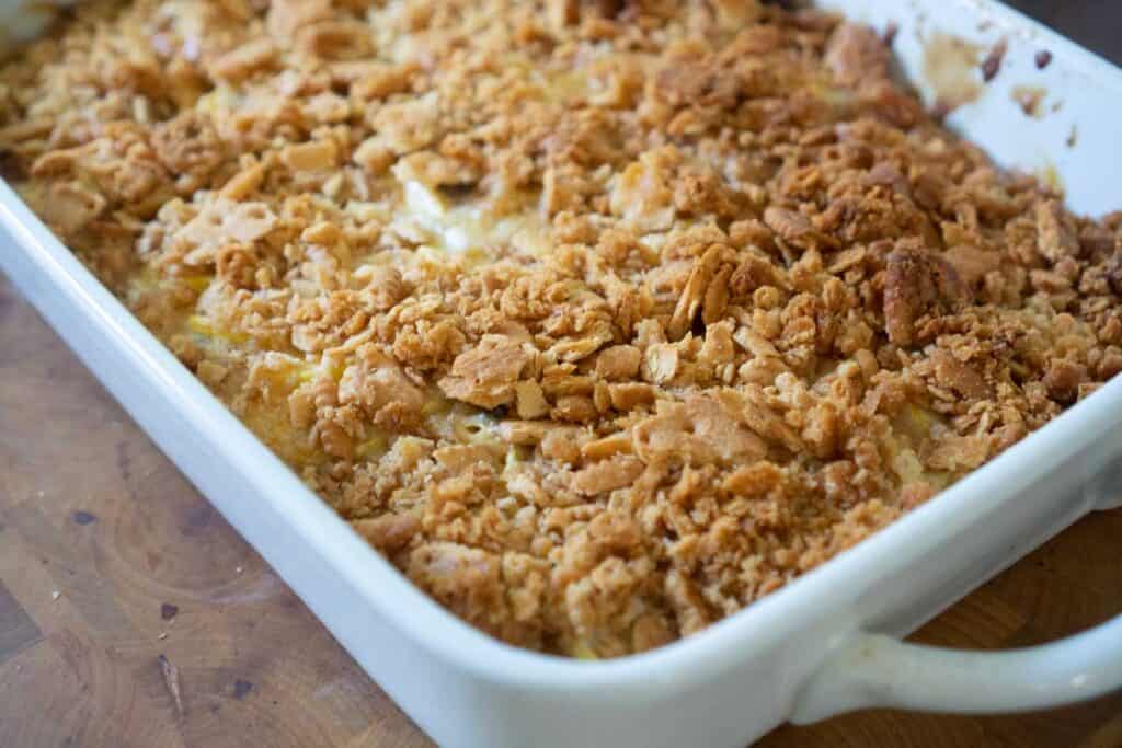 southern squash casserole in white dish