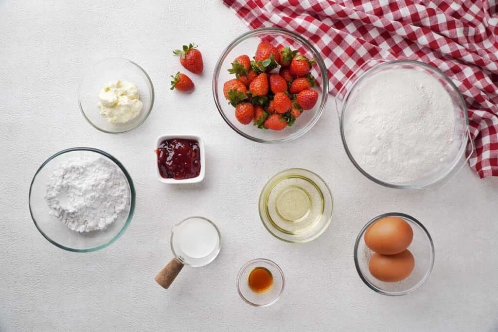 strawberry brownies ingredients on white countertop