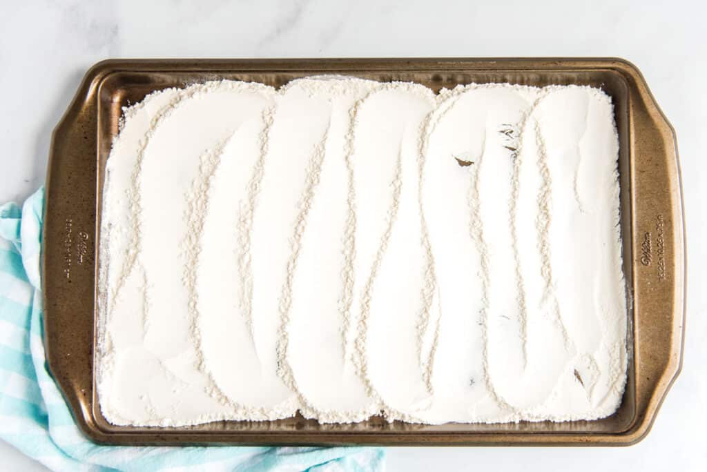 toasting flour on baking sheet