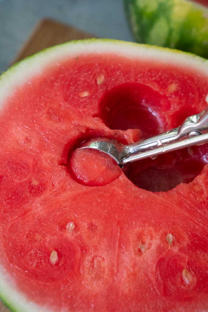 scooping watermelon with melon baller