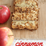 apple cinnamon bread on cutting board with apples